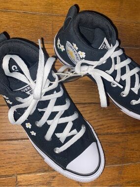 Converse  Black High-Top Sneakers with White Laces and Daisy Accents